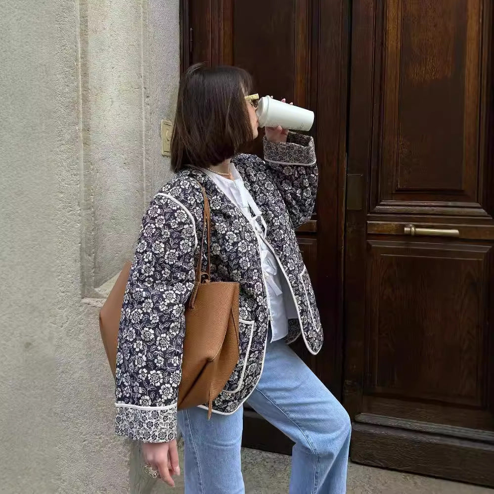 Women's elegant floral jacket in an oversized cut with structured details, size S