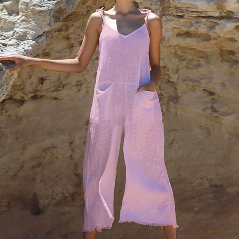 Women's linen jumpsuit with stylish V-neck and practical pockets, size S
