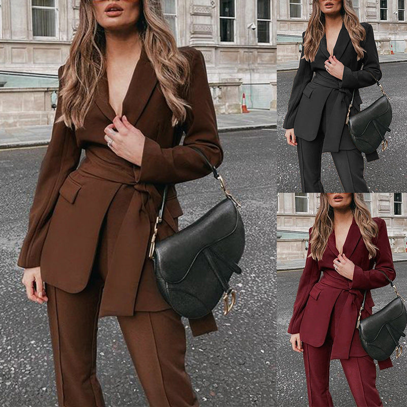 Women's blazer suit with tailored cut and elegant belt, size