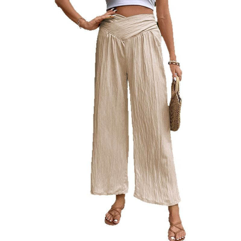 Women's pleated trousers with a high waist and elegant cut, size S