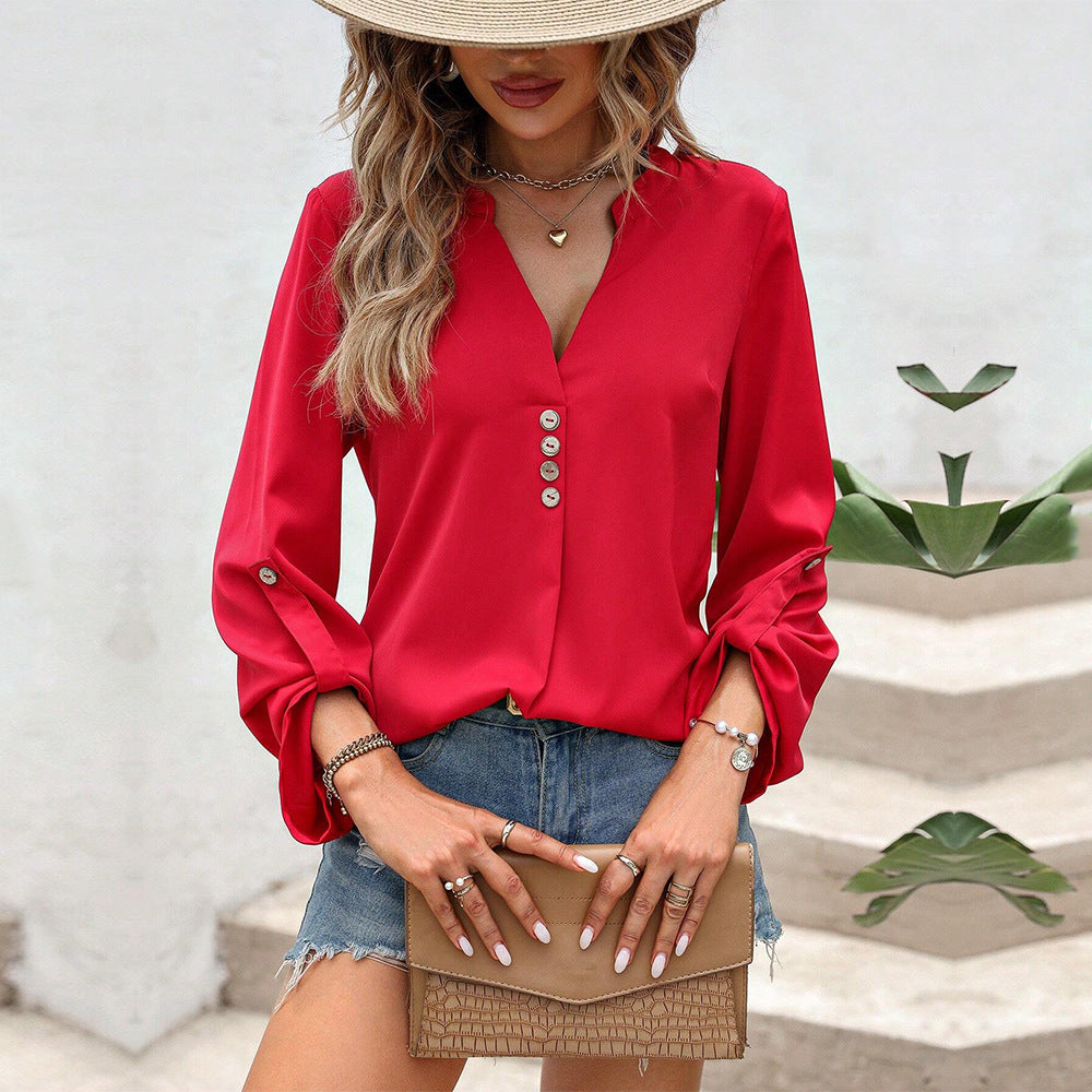 Women's blouse with elegant V-neck and refined button details, size