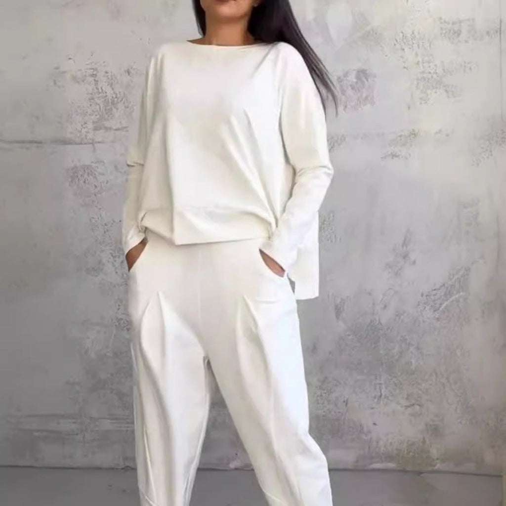 Valenzora | Solid color slim-fit trouser suit with round neckline