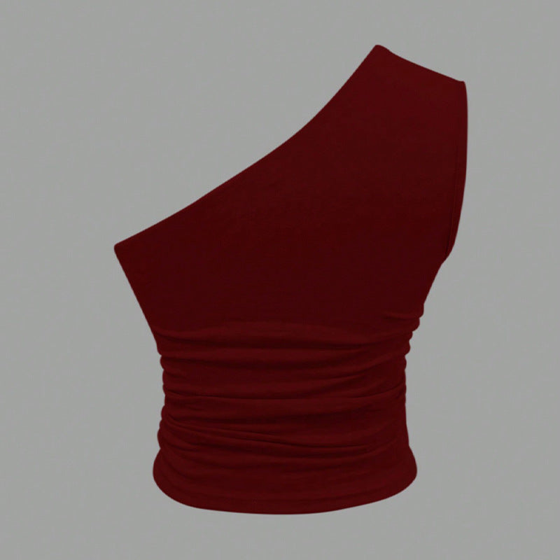 Women's asymmetrical crop top with figure-flattering design, size