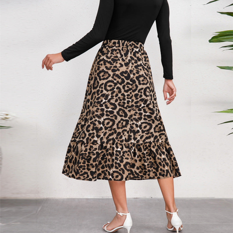 Women's midi skirt with elegant leopard print and flowing cut, size