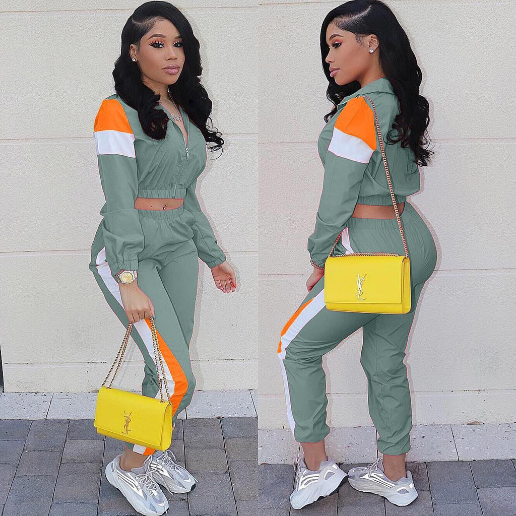 Women's tracksuit with fashionable color accents, size