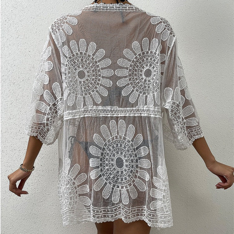 Women's crochet beach wrap with floral embroidery and open sleeves, size [size]
