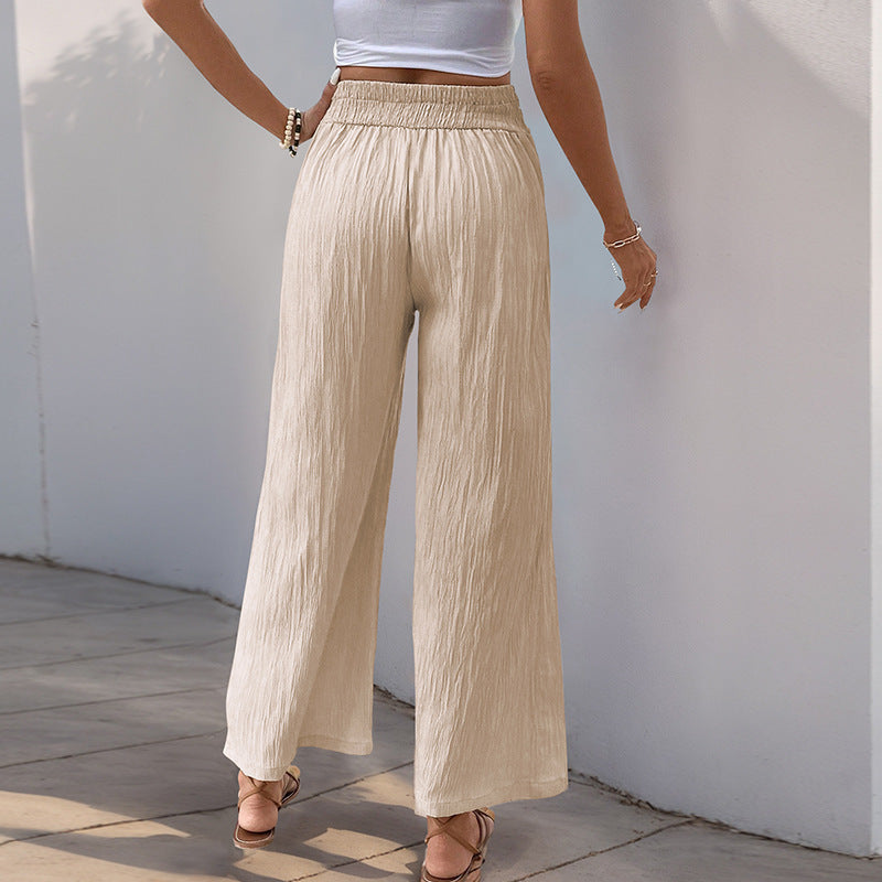Women's pleated trousers with a high waist and elegant cut, size S
