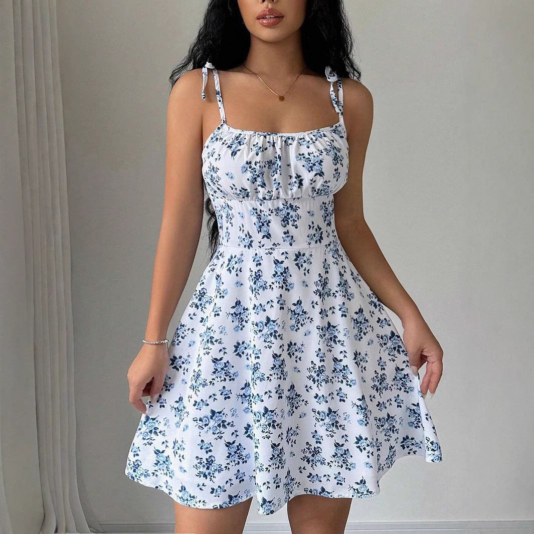 Women's summer dress with adjustable spaghetti straps and floral accents, size [size missing]