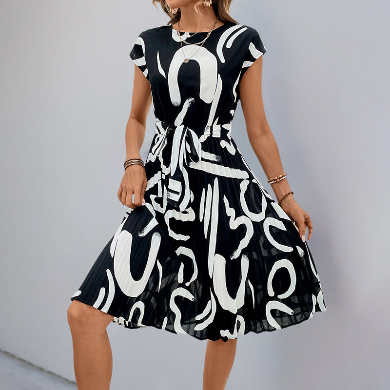 Women's midi dress with a sophisticated waist belt and playful pattern, size