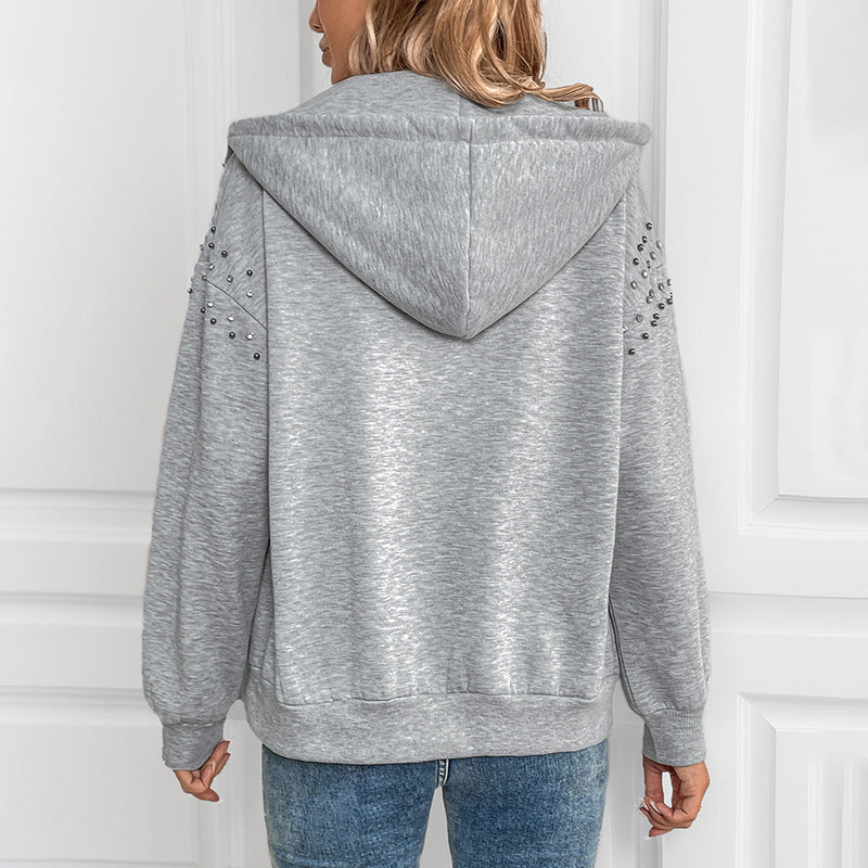 Women's hoodie with decorative studs and a relaxed fit, size S