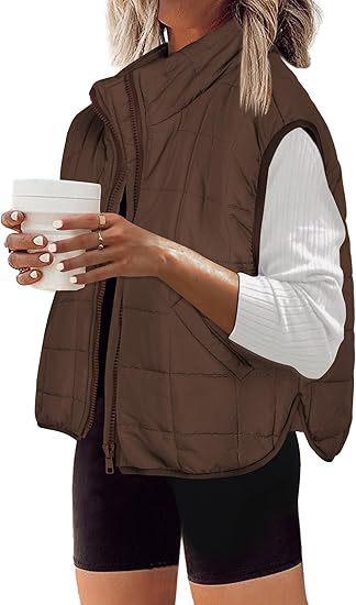 Women's quilted vest with high collar and practical side pockets, size