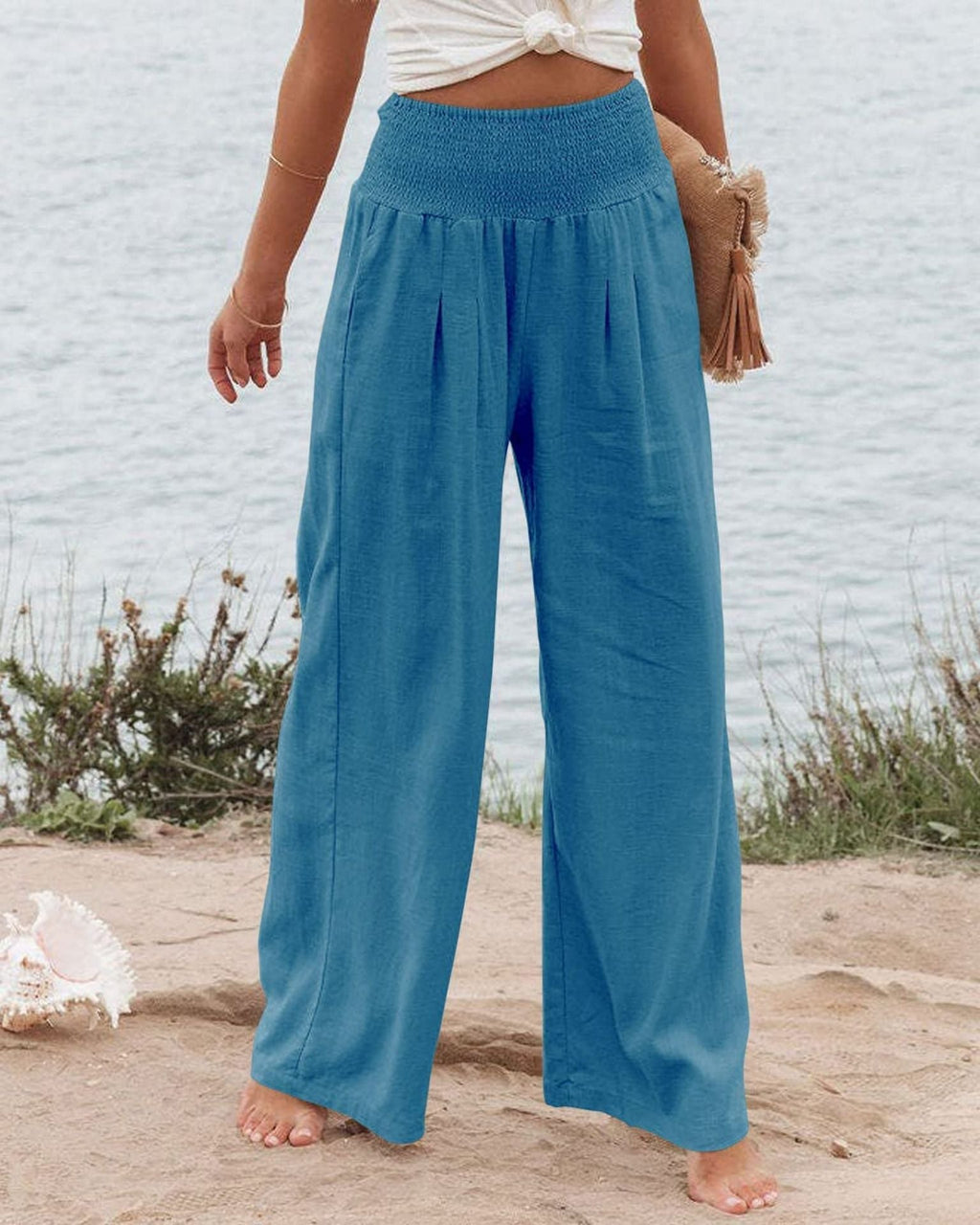 Women's wide-legged linen trousers with elasticated waistband and pleats, size