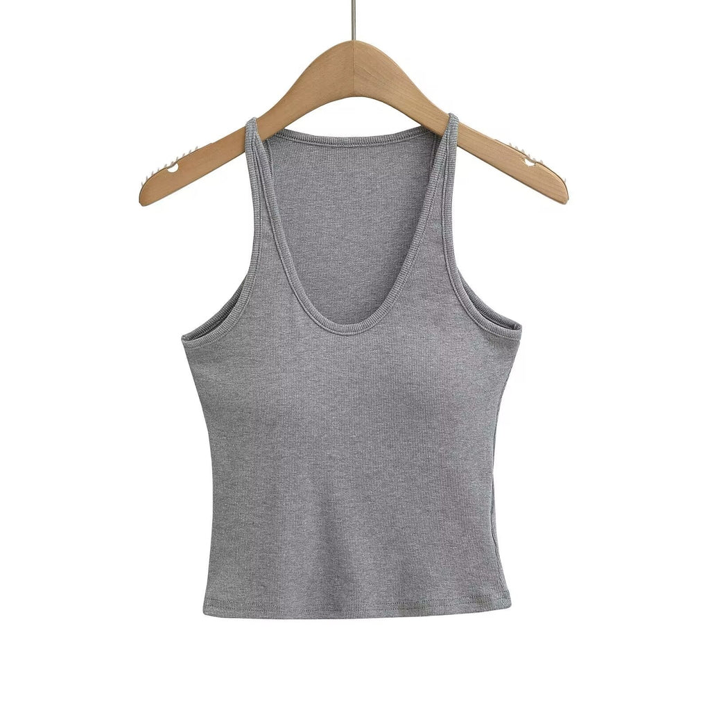 Women's sleeveless sports top with deep U-neck and elastic material, size S