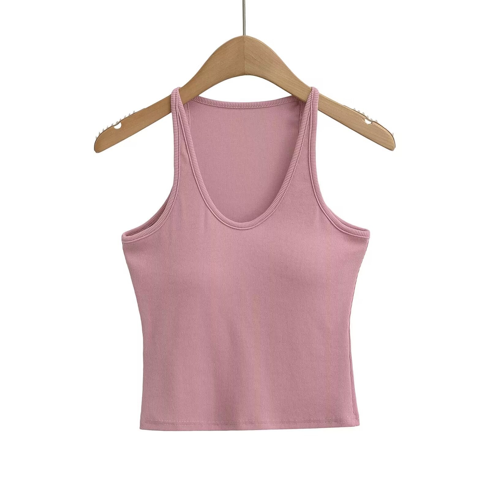 Women's sleeveless sports top with deep U-neck and elastic material, size S