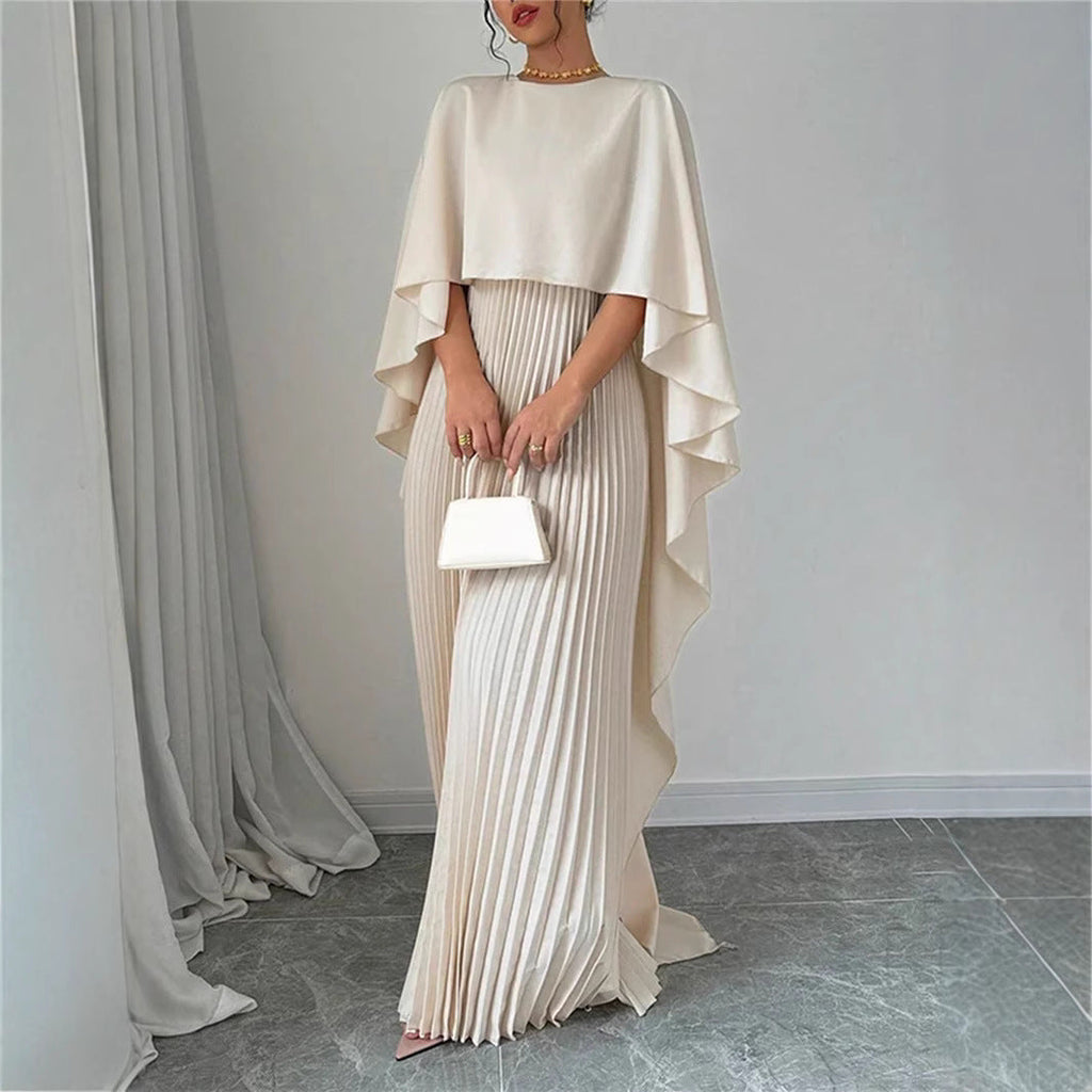 Valenzora | Elegant long dress with batwing sleeves, pleated asymmetrical design, and flowing fit