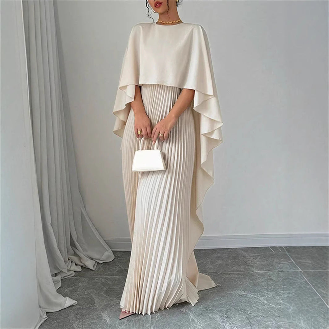 Valenzora | Elegant long dress with batwing sleeves, pleated asymmetrical design, and flowing fit