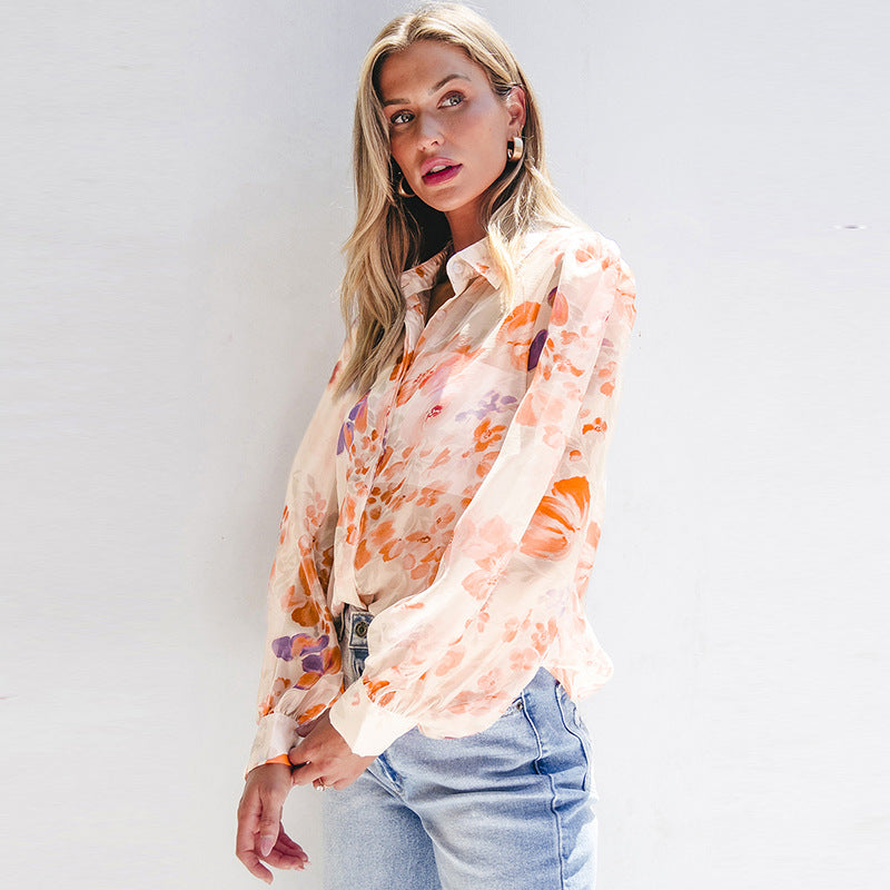 Women's airy blouse shirt with floral design and voluminous sleeves, size S