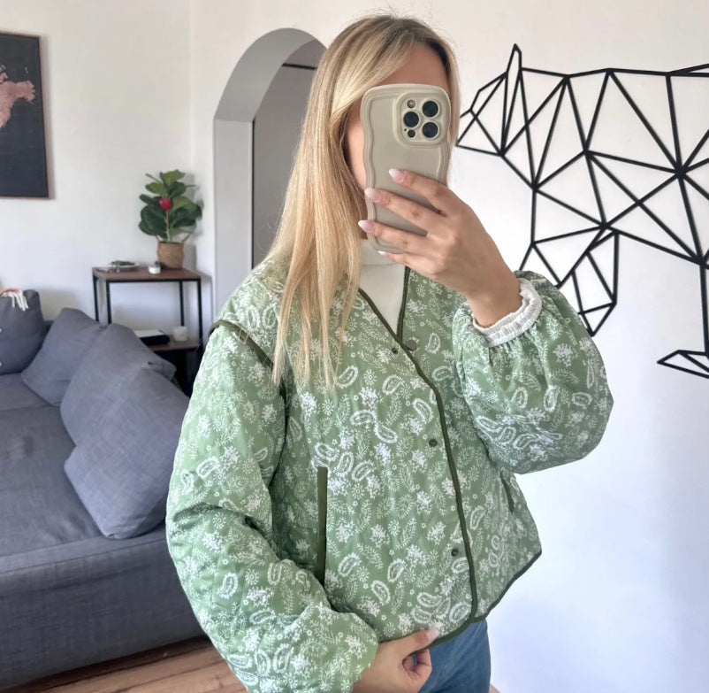 Women's quilted jacket with floral design and practical pockets, size S