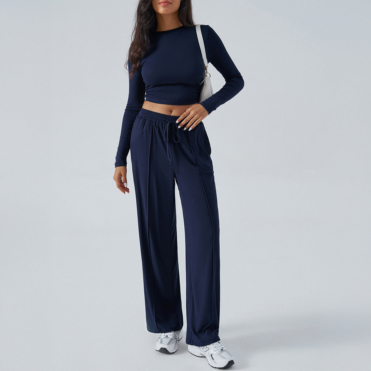 Women's casual two-piece set with a loose-fitting top and elasticated trousers, size