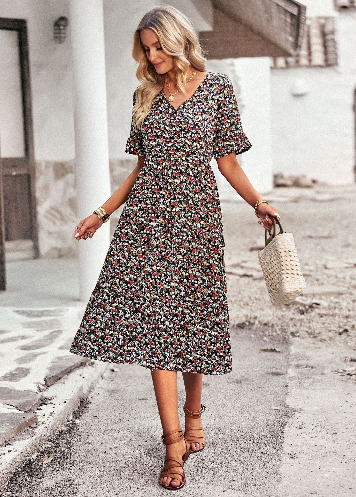 Women's midi dress with floral pattern and playful V-neck, size