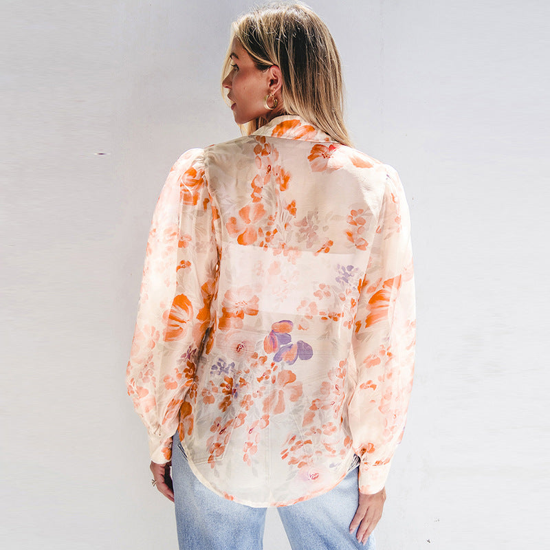 Women's airy blouse shirt with floral design and voluminous sleeves, size S