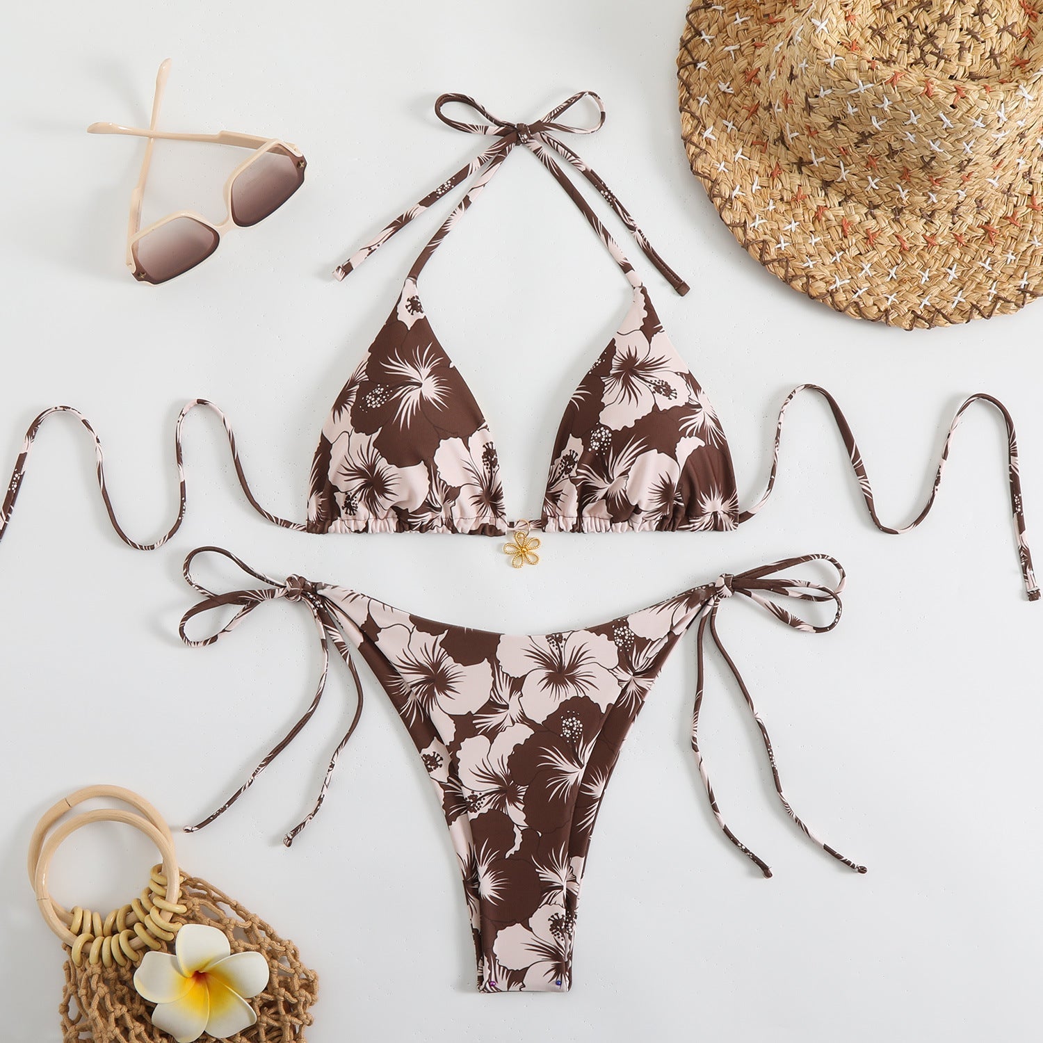 Valenzora | Women's triangle bikini set with playful floral pattern and tie straps