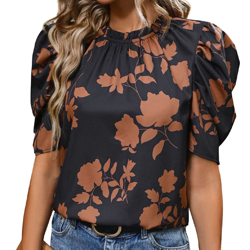 Women's blouse with puff sleeves and floral pattern, size