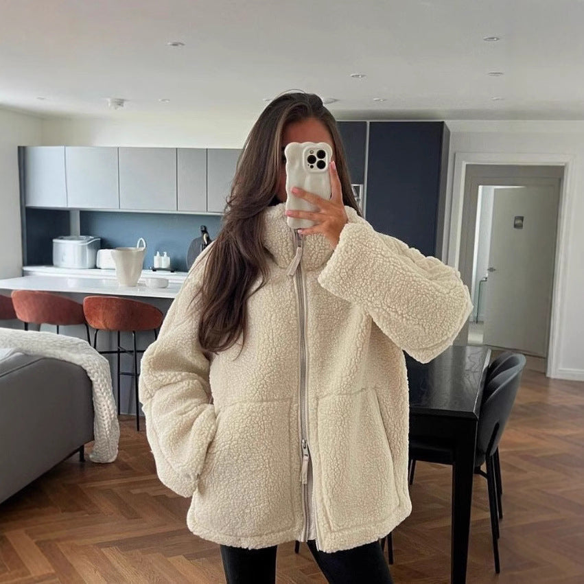 Women's cozy fleece jacket with high collar and practical pockets, size
