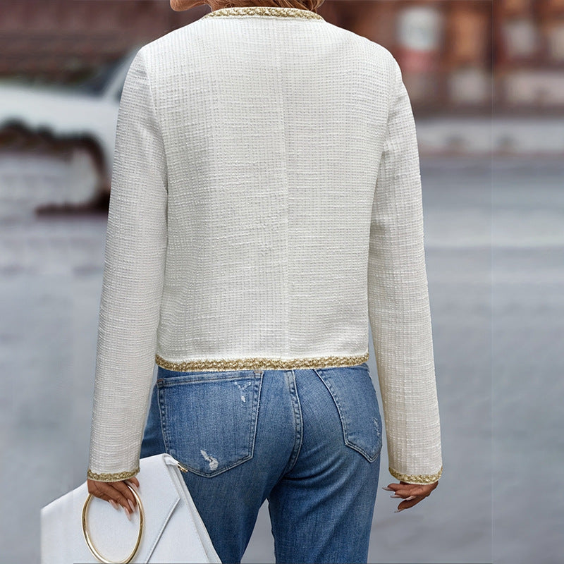 Women's elegant jacket with textured fabric and fashionable button details, size
