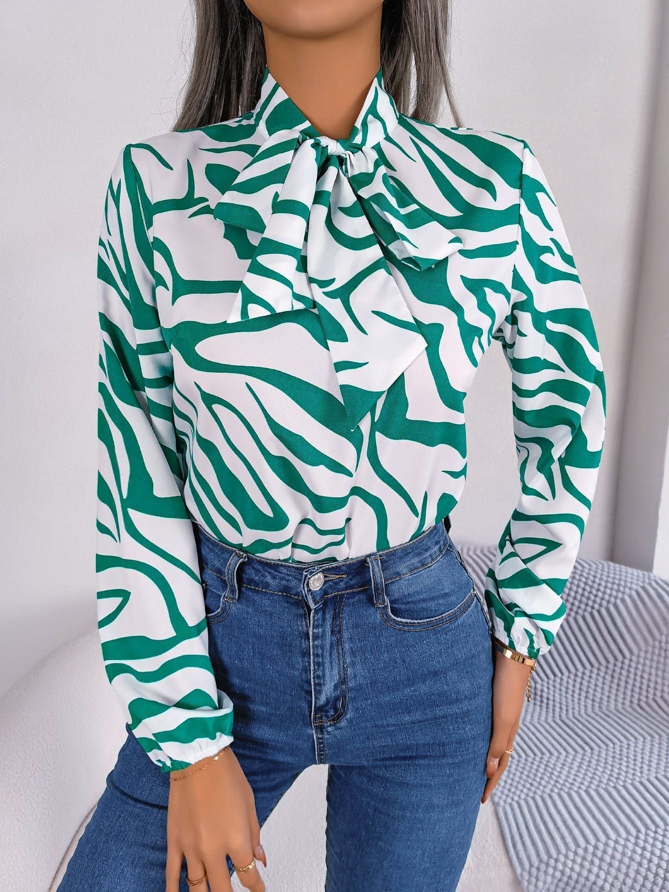Women's blouse with fashionable zebra pattern and elegant bow collar, size