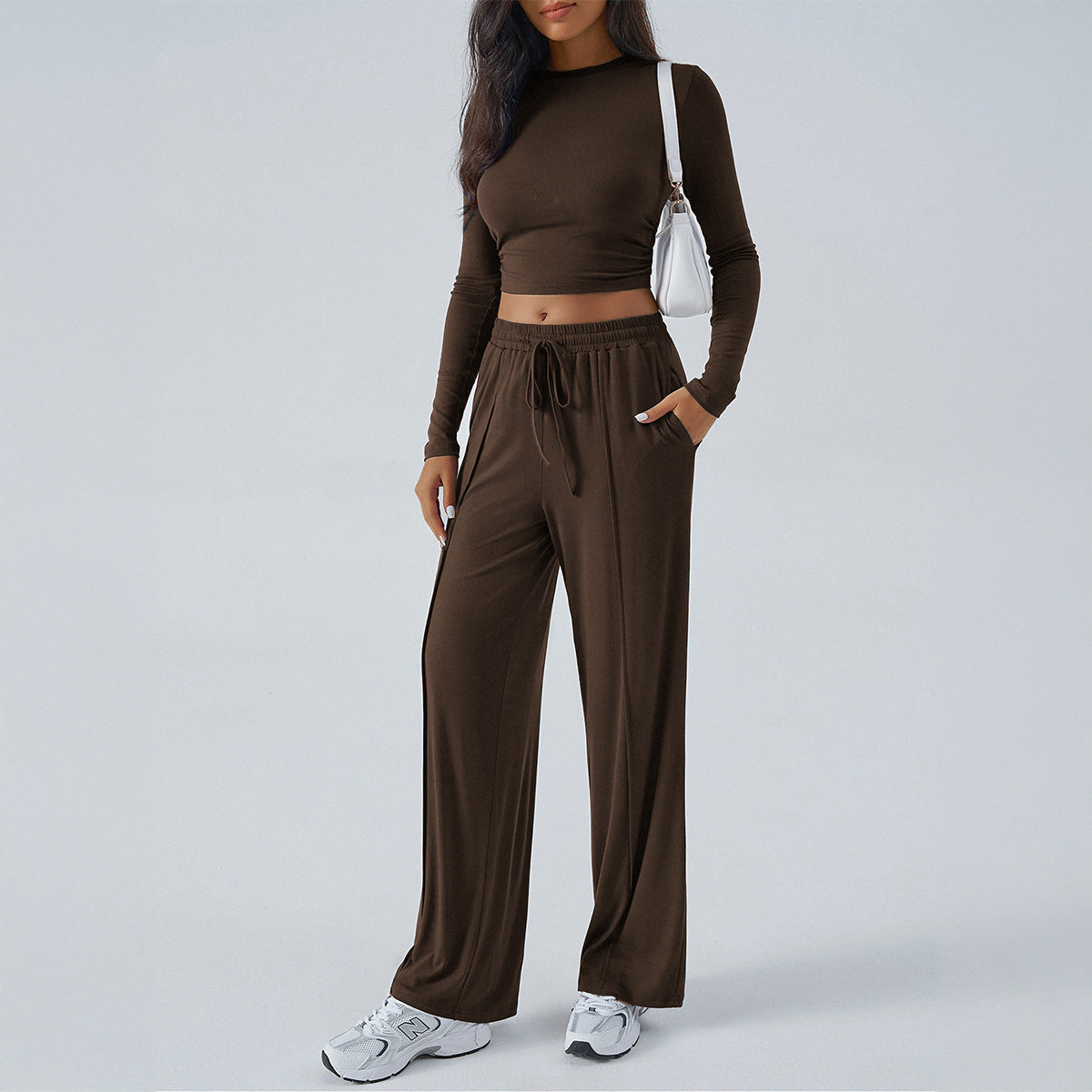 Women's casual two-piece set with a loose-fitting top and elasticated trousers, size