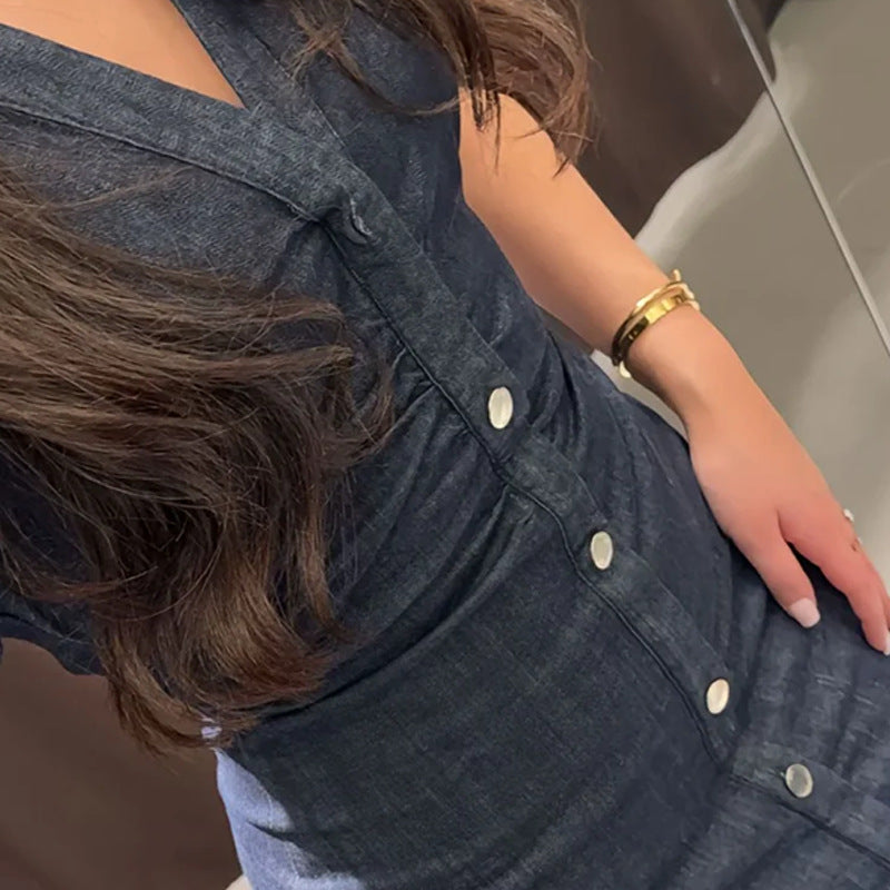 Women's knee-length denim dress with elegant button design, size