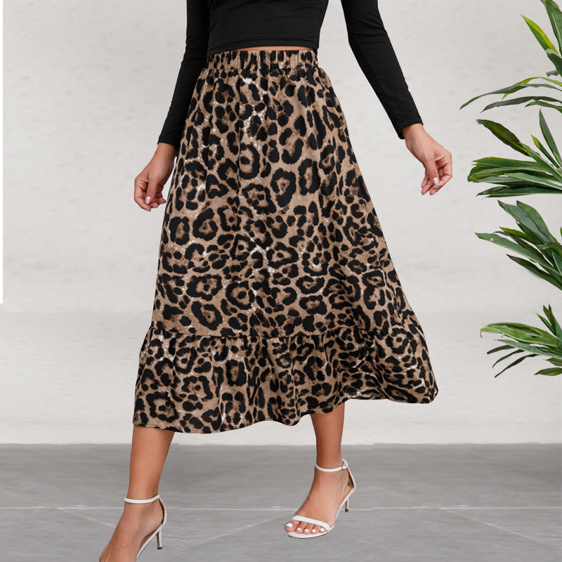 Women's midi skirt with elegant leopard print and flowing cut, size