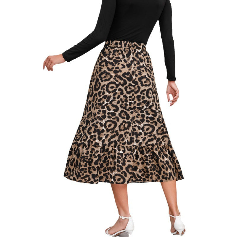 Women's midi skirt with elegant leopard print and flowing cut, size