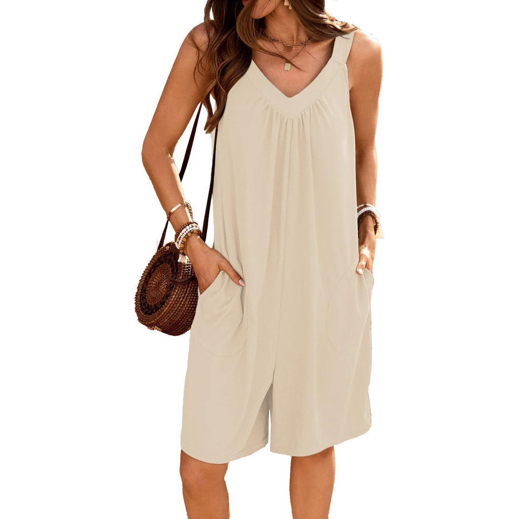 Women's sleeveless jumpsuit with deep V-neck and practical pockets, size S
