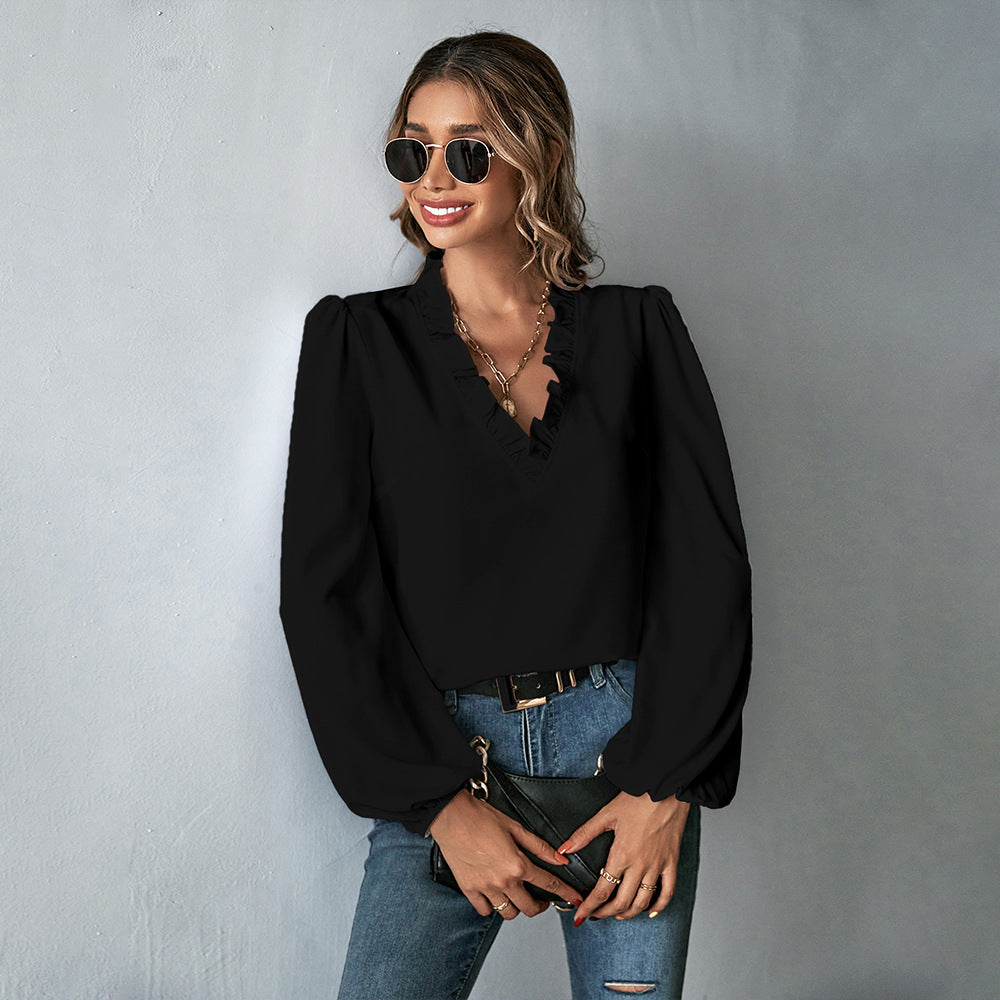 Women's blouse with voluminous sleeves and elegant ruffle decoration, size S