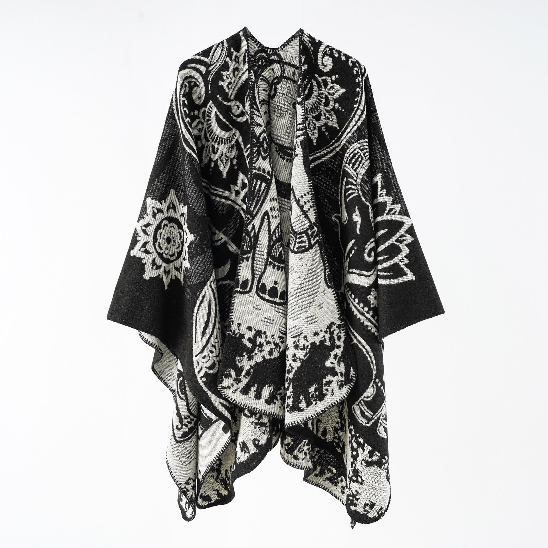 Women's elegant transitional poncho with an artistic floral pattern and fringed edges, size Valenzora