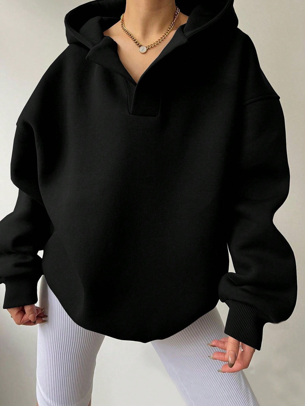 Women's oversized hoodie with a modern stand-up collar and soft materials, size S