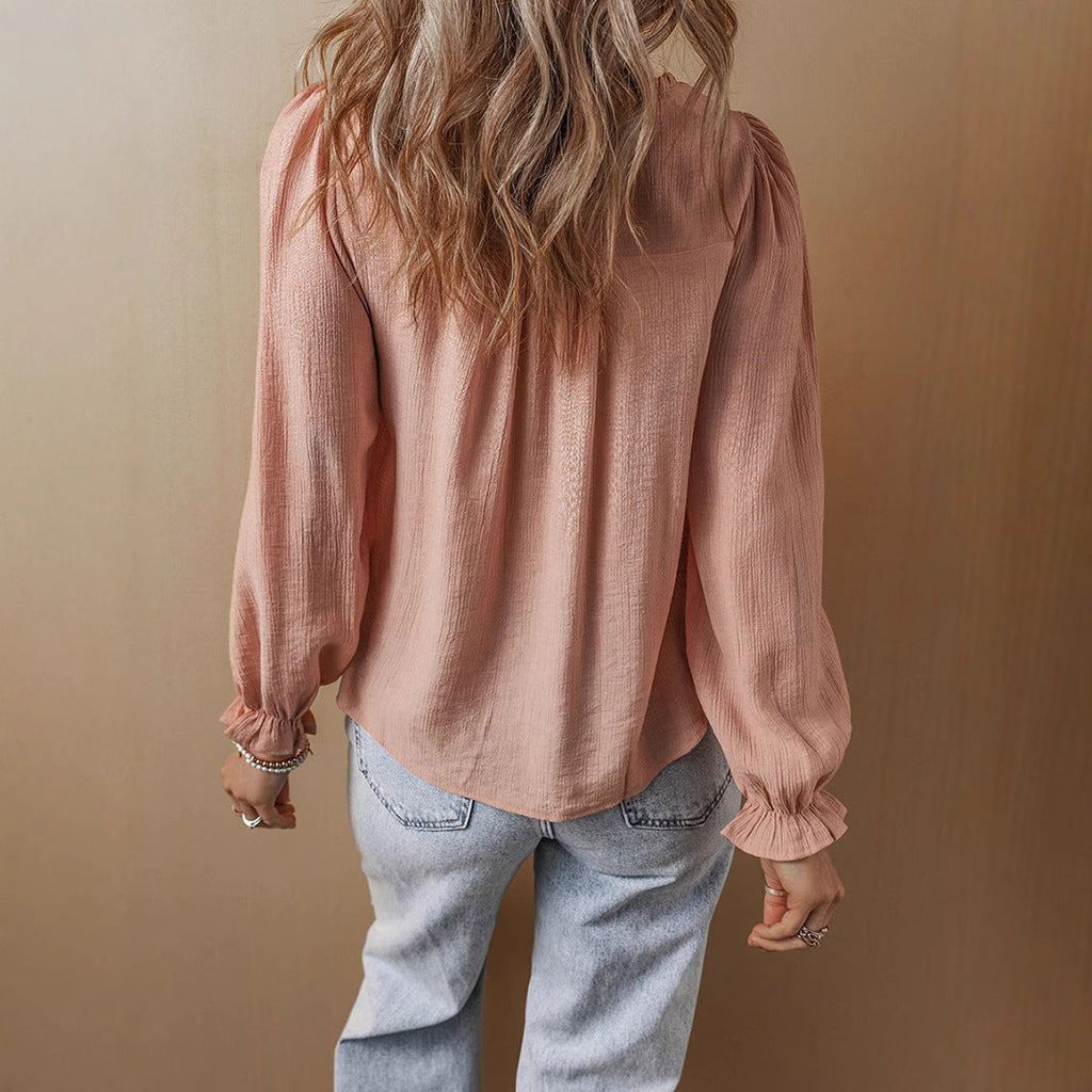 Women's blouse with artistic embroidery and a relaxed fit, size S