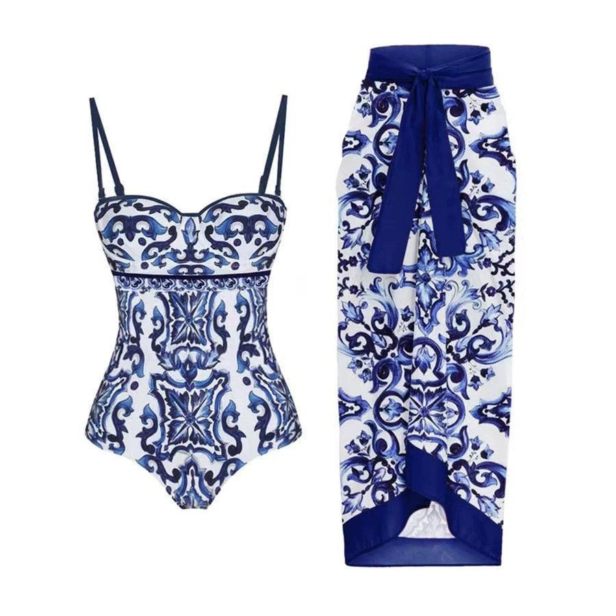 Women's swimsuit set with elegant wrap skirt look and charming motif, size S