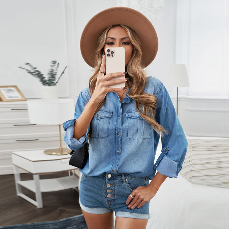 Women's denim shirt blouse with practical chest pockets and classic cut, size S