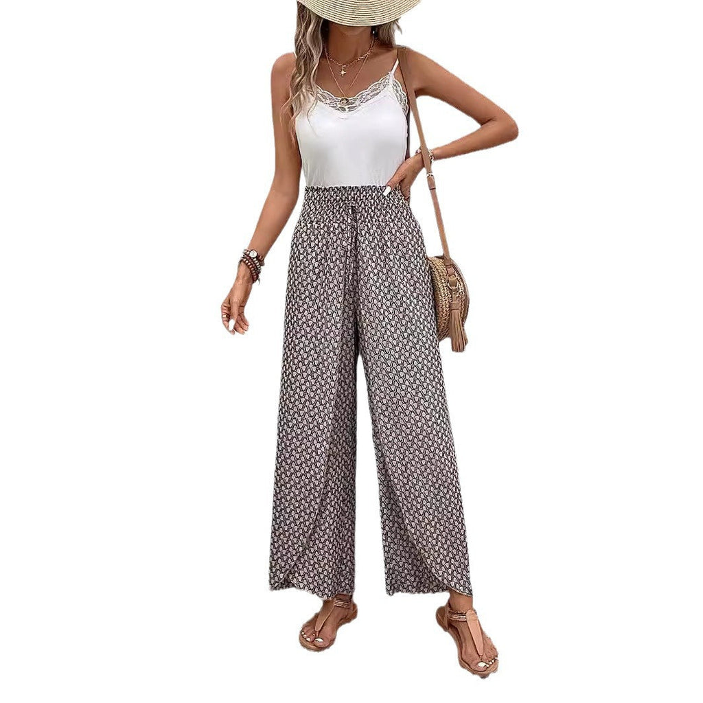 Women's wide-leg summer trousers with elasticated waistband and floral design, size S