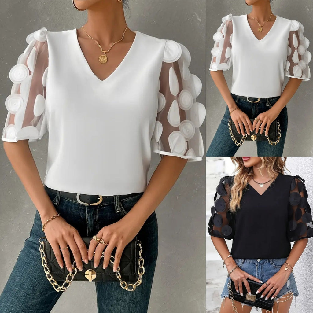 Women's blouse with sheer puff sleeves and elegant details, size S