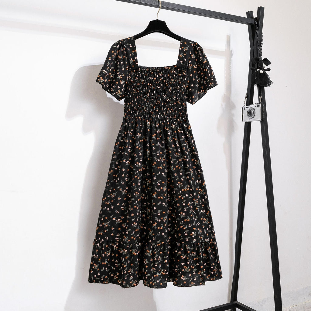 Women's floral print midi dress with elasticated waist and voluminous skirt, size [size]