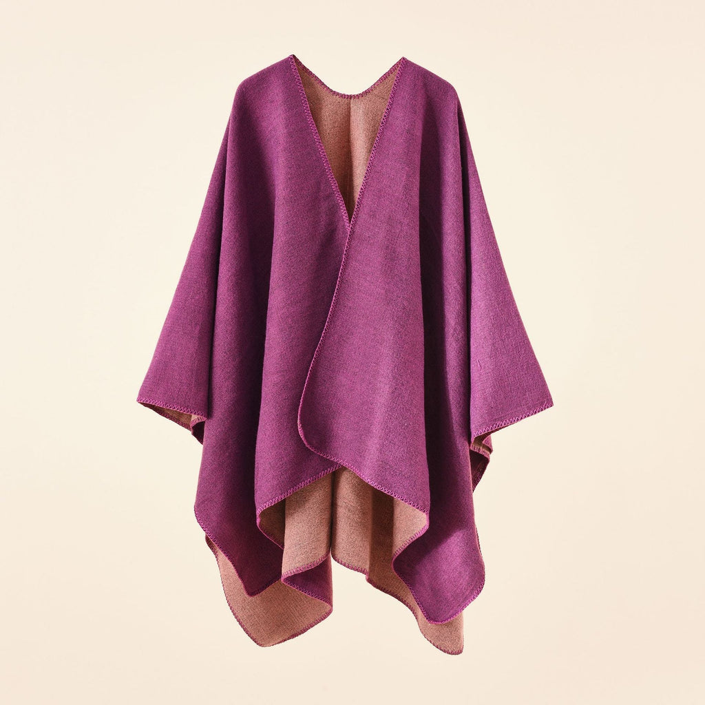 Women's knitted poncho with asymmetrical cut and high warmth retention, size
