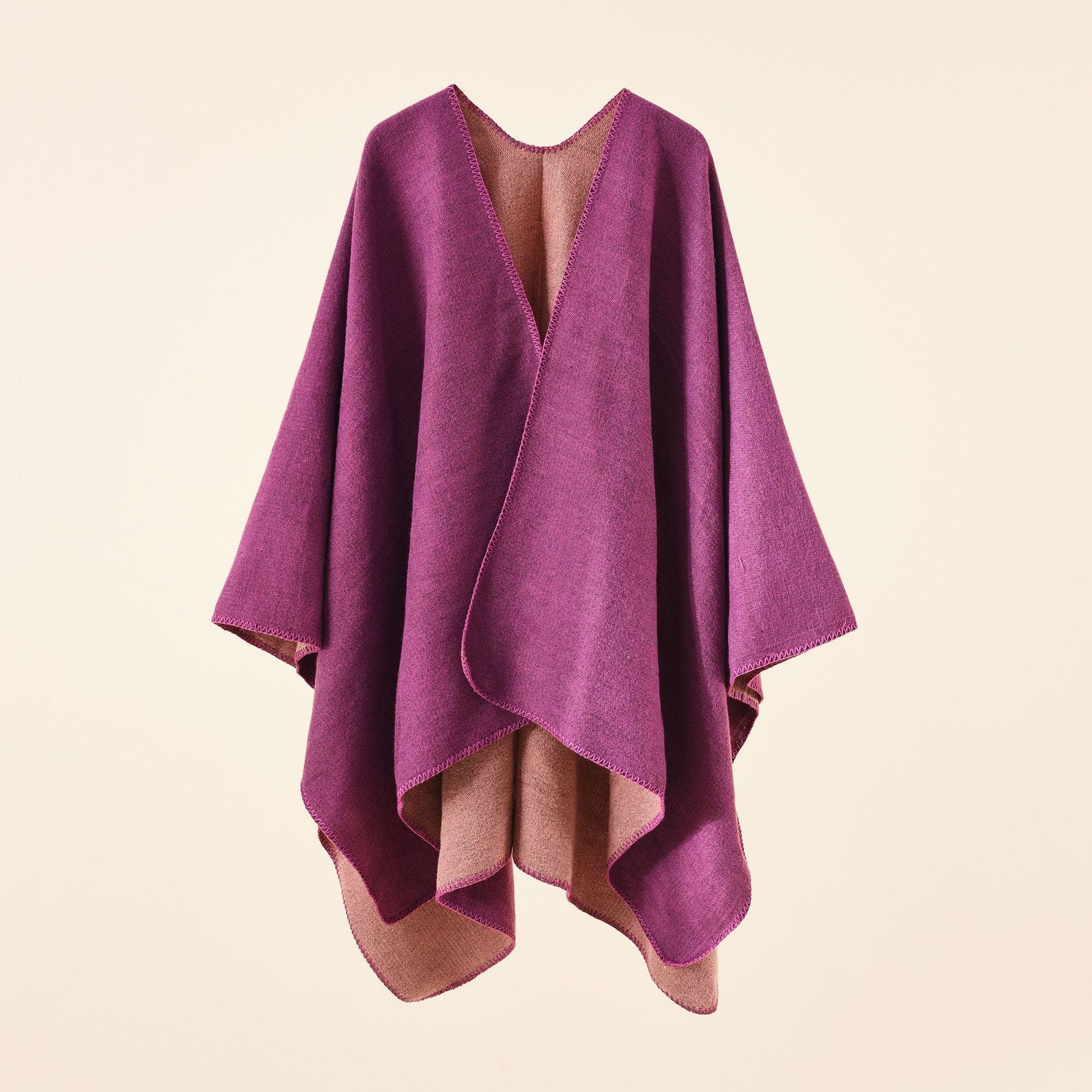 Women's knitted poncho with asymmetrical cut and high warmth retention, size