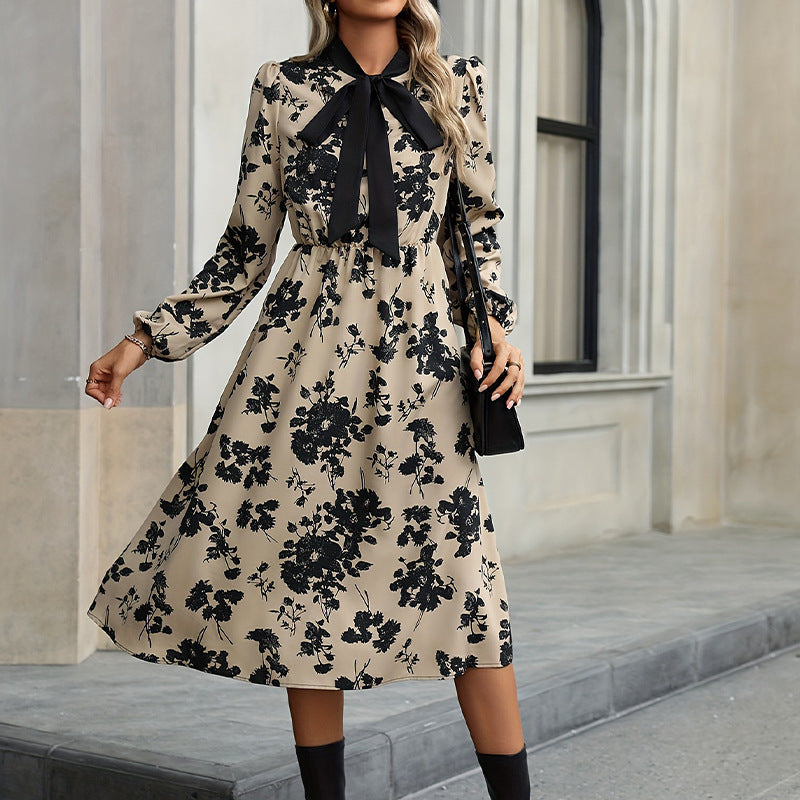 Elegantes Damen-Midikleid mit Blumenmuster und Schleifendetails, Größe