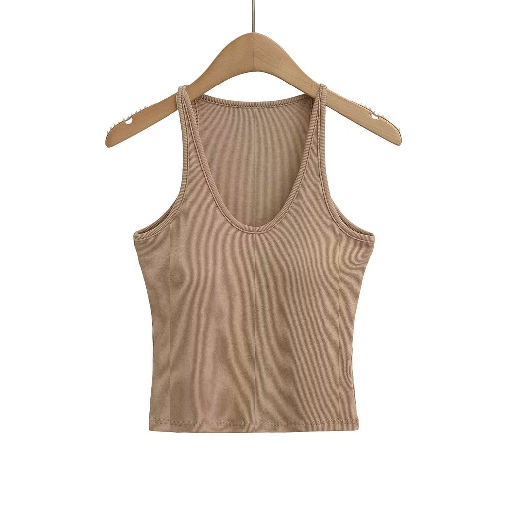Women's sleeveless sports top with deep U-neck and elastic material, size S