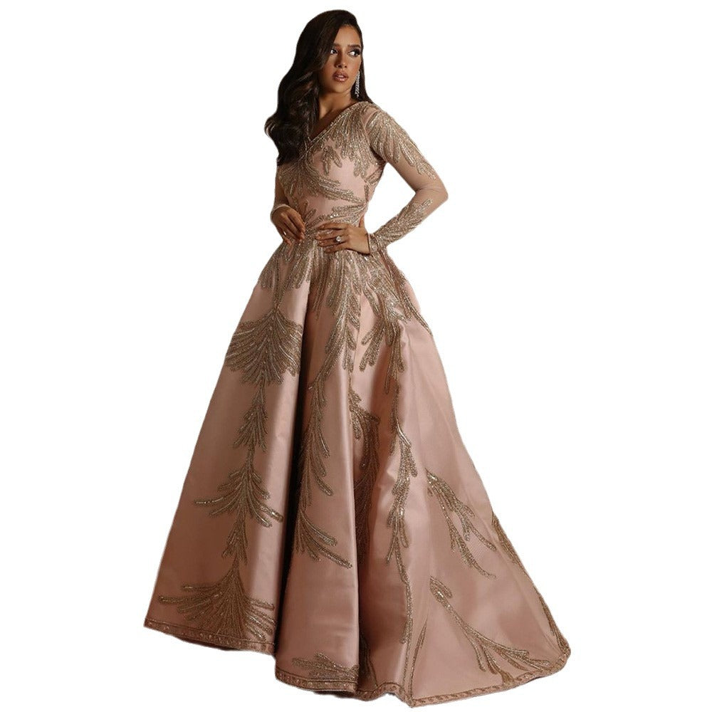 Women's glamorous ball gown with delicate sequin embellishment and long cut, size S