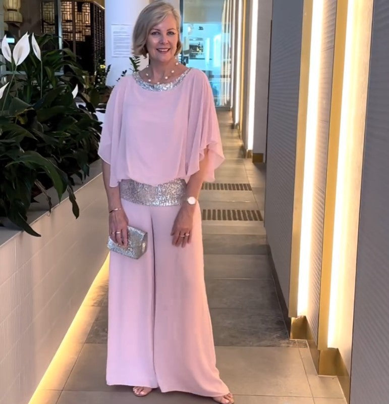 Women's elegant jumpsuit with a flattering cut and sparkling waist belt, size [size missing]